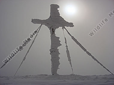 Vereistes Gipfelkreuz